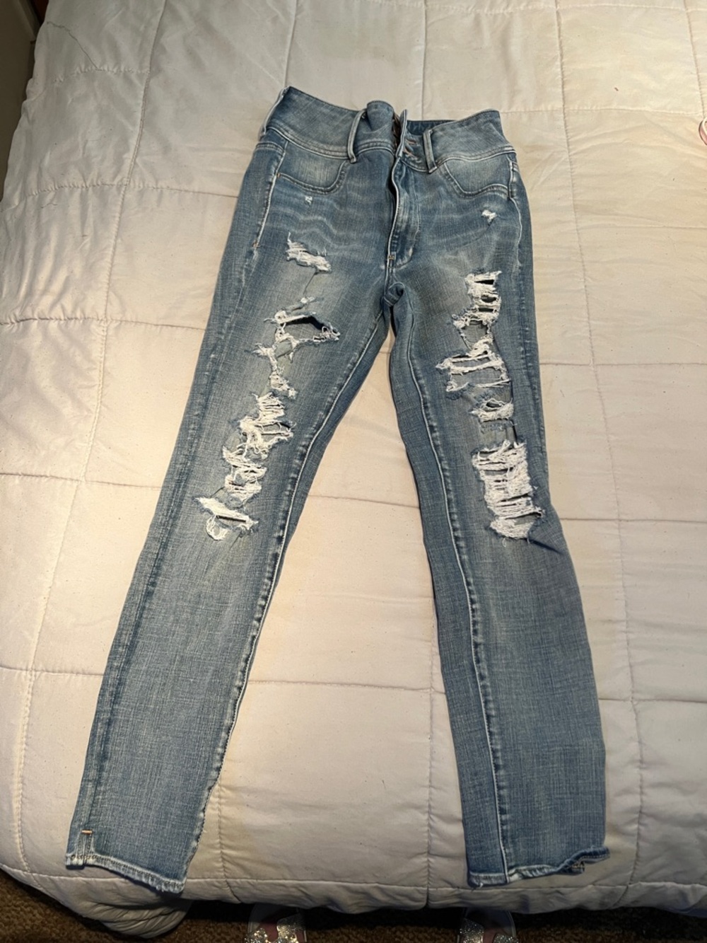 American Eagle Outfitters Light Blue Ripped Super High Rise Jeggings